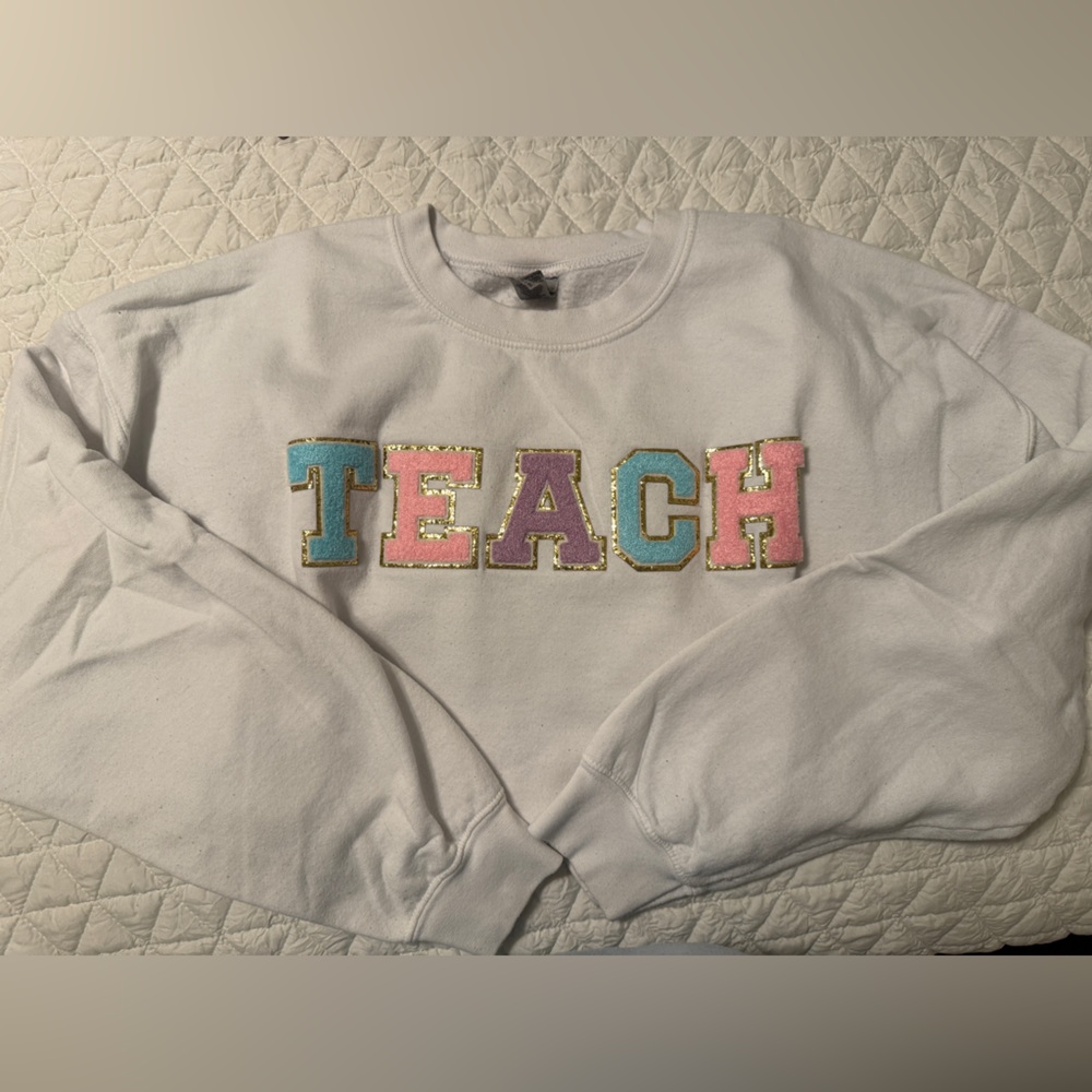 Gildan White Sweatshirt with Multicolor 'TEACH' Design